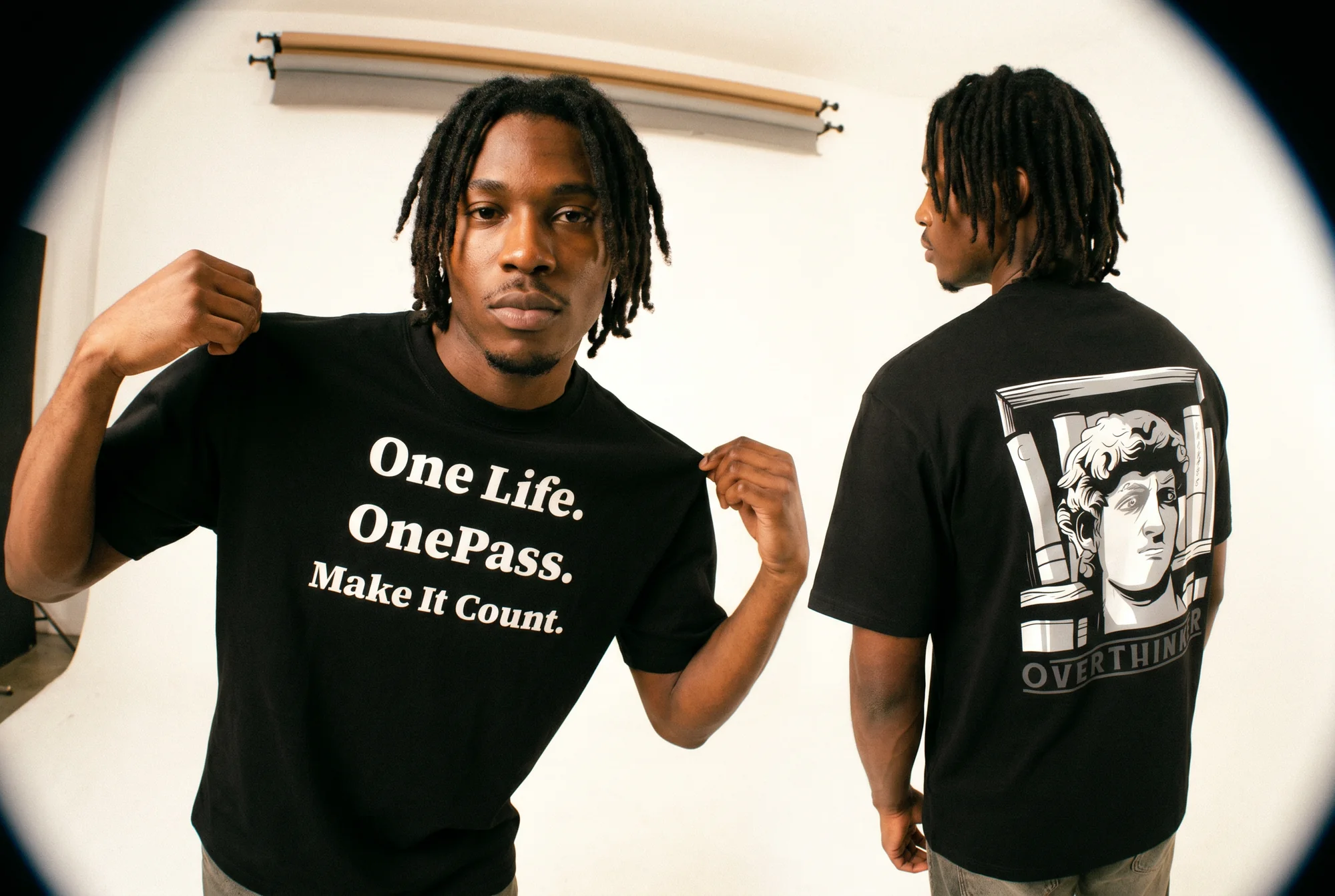 OnePass models wearing the One Life and Overthinker tees
